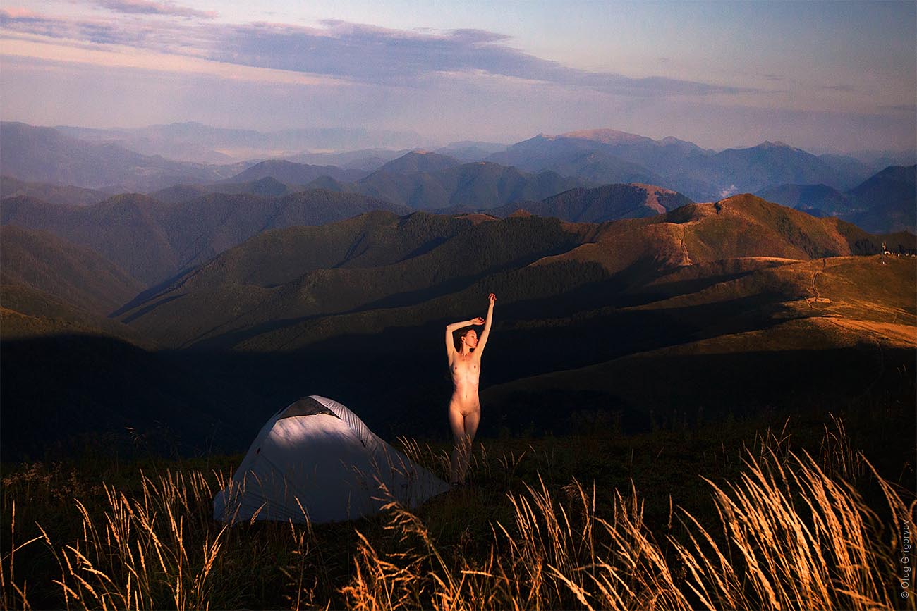 Naked girl in the mountains