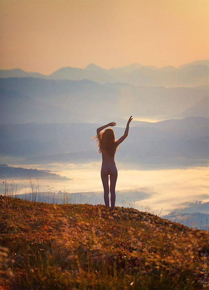 Naked girl in the mountains